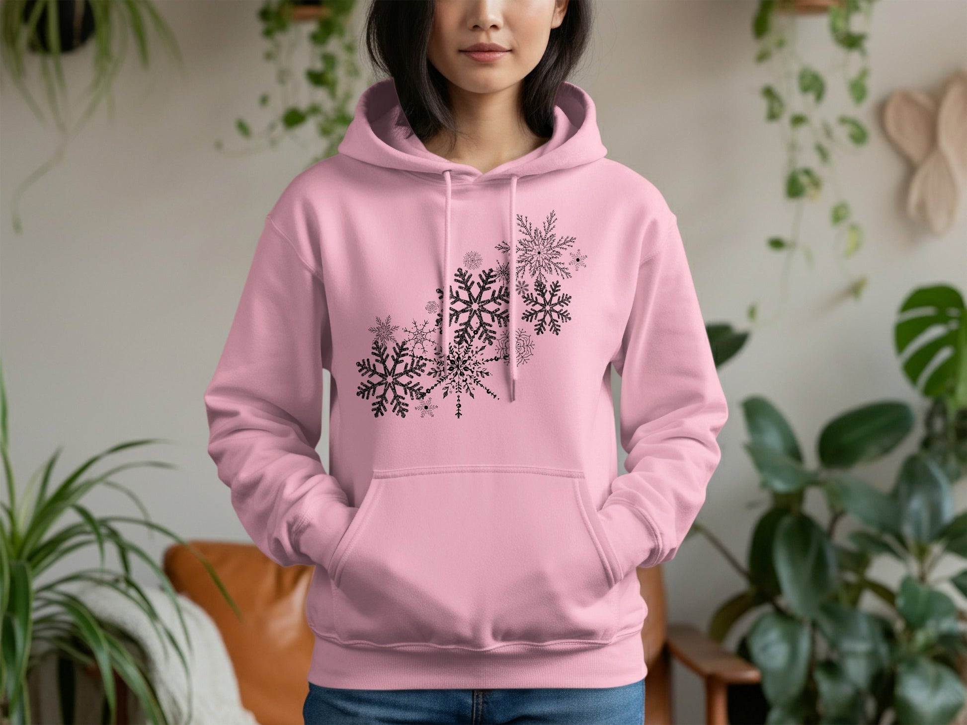 Stylish Pink Hoodie with Intricate Snowflake Design